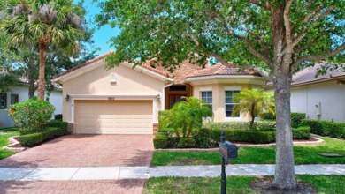 Former model home loaded with upgrades! Soaring volume ceilings on PGA Golf Club in PGA Village in Florida - for sale on GolfHomes.com, golf home, golf lot