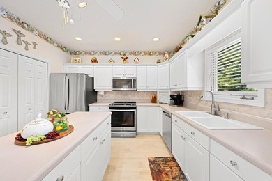 Beautiful custom-built home with a covered boat slip and on The Trail At Chickasaw Pointe in South Carolina - for sale on GolfHomes.com, golf home, golf lot