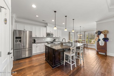 This stunning modern Low Country-style home is perfectly on Members Club At St. James Plantation in North Carolina - for sale on GolfHomes.com, golf home, golf lot