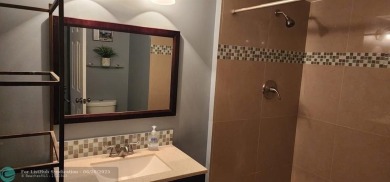 Beautifully renovated corner unit with the assessment fully paid on Bonaventure Country Club in Florida - for sale on GolfHomes.com, golf home, golf lot