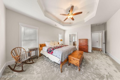 This stunning modern Low Country-style home is perfectly on Members Club At St. James Plantation in North Carolina - for sale on GolfHomes.com, golf home, golf lot