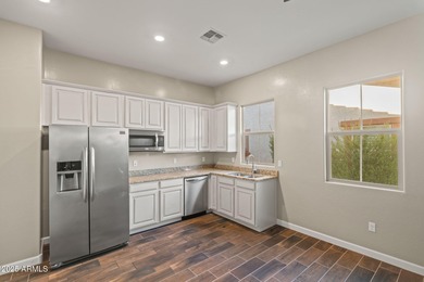 AMAZING GOLF COURSE LOT AND HOME NESTLED IN VERRADO VICTORY WITH on Verrado Golf Club - Victory in Arizona - for sale on GolfHomes.com, golf home, golf lot