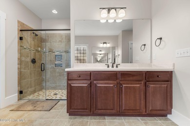 This stunning modern Low Country-style home is perfectly on Members Club At St. James Plantation in North Carolina - for sale on GolfHomes.com, golf home, golf lot