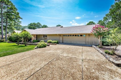 Paradise Awaits at this Lakefront home overlooking Greers Ferry on Red Apple Inn and Country Club in Arkansas - for sale on GolfHomes.com, golf home, golf lot