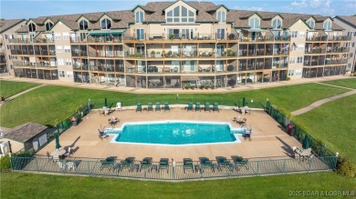 ENJOY THE AMAZING LAKE VIEW from the deck of this well decorated on Lake Valley Country Club in Missouri - for sale on GolfHomes.com, golf home, golf lot