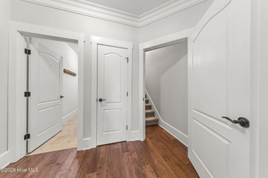 This stunning modern Low Country-style home is perfectly on Members Club At St. James Plantation in North Carolina - for sale on GolfHomes.com, golf home, golf lot