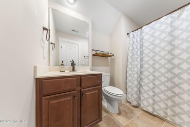 This stunning modern Low Country-style home is perfectly on Members Club At St. James Plantation in North Carolina - for sale on GolfHomes.com, golf home, golf lot