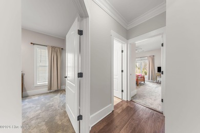 This stunning modern Low Country-style home is perfectly on Members Club At St. James Plantation in North Carolina - for sale on GolfHomes.com, golf home, golf lot