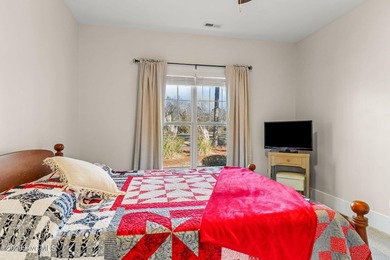 This stunning modern Low Country-style home is perfectly on Members Club At St. James Plantation in North Carolina - for sale on GolfHomes.com, golf home, golf lot