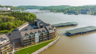 ENJOY THE AMAZING LAKE VIEW from the deck of this well decorated on Lake Valley Country Club in Missouri - for sale on GolfHomes.com, golf home, golf lot