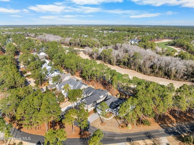 This stunning modern Low Country-style home is perfectly on Members Club At St. James Plantation in North Carolina - for sale on GolfHomes.com, golf home, golf lot