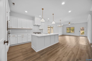 This beautifully crafted residence features an open floor plan on Canebrake Golf Club in Alabama - for sale on GolfHomes.com, golf home, golf lot