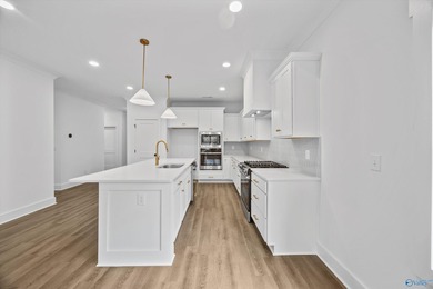 This beautifully crafted residence features an open floor plan on Canebrake Golf Club in Alabama - for sale on GolfHomes.com, golf home, golf lot