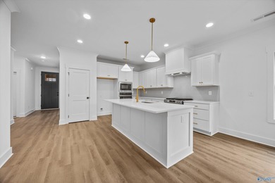 This beautifully crafted residence features an open floor plan on Canebrake Golf Club in Alabama - for sale on GolfHomes.com, golf home, golf lot