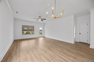 This beautifully crafted residence features an open floor plan on Canebrake Golf Club in Alabama - for sale on GolfHomes.com, golf home, golf lot