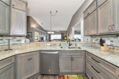 Welcome to your dream home, a beautifully updated, fully on Heritage Oaks Golf and Country Club in Florida - for sale on GolfHomes.com, golf home, golf lot