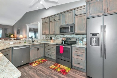 Welcome to your dream home, a beautifully updated, fully on Heritage Oaks Golf and Country Club in Florida - for sale on GolfHomes.com, golf home, golf lot