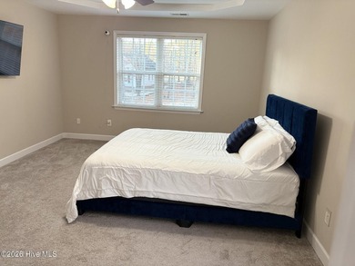 This stunning single-family home located in a gated community at on Carolina Lakes Country Club in North Carolina - for sale on GolfHomes.com, golf home, golf lot