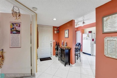 This is the one! A top-floor, move-in-ready 2 bed, 2 bath condo on Flamingo Lakes Country Club in Florida - for sale on GolfHomes.com, golf home, golf lot