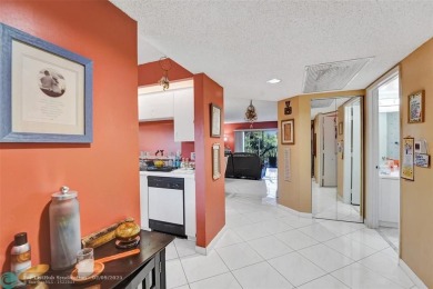 This is the one! A top-floor, move-in-ready 2 bed, 2 bath condo on Flamingo Lakes Country Club in Florida - for sale on GolfHomes.com, golf home, golf lot