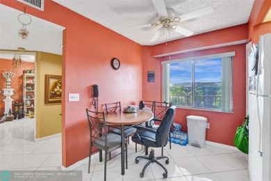 This is the one! A top-floor, move-in-ready 2 bed, 2 bath condo on Flamingo Lakes Country Club in Florida - for sale on GolfHomes.com, golf home, golf lot