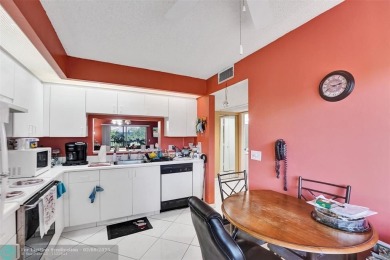 This is the one! A top-floor, move-in-ready 2 bed, 2 bath condo on Flamingo Lakes Country Club in Florida - for sale on GolfHomes.com, golf home, golf lot
