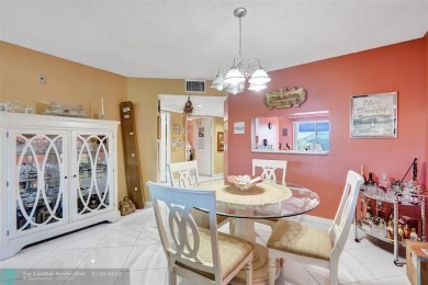 This is the one! A top-floor, move-in-ready 2 bed, 2 bath condo on Flamingo Lakes Country Club in Florida - for sale on GolfHomes.com, golf home, golf lot