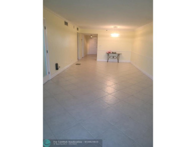 Spectacular Views of Lake and Golf Course from this 9th Floor 2 on Palm-Aire Country Club and Resort - Palms in Florida - for sale on GolfHomes.com, golf home, golf lot