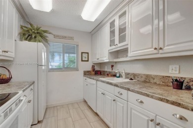 Welcome home to this cozy and bright corner villa condo in the on Leisureville Community Golf Course in Florida - for sale on GolfHomes.com, golf home, golf lot