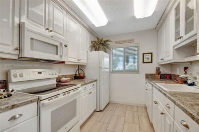 Welcome home to this cozy and bright corner villa condo in the on Leisureville Community Golf Course in Florida - for sale on GolfHomes.com, golf home, golf lot