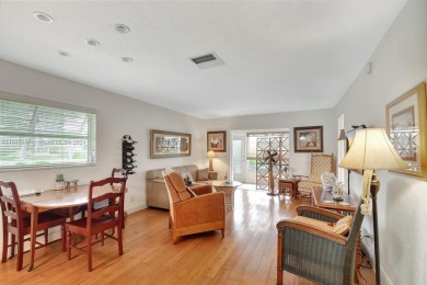 Welcome home to this cozy and bright corner villa condo in the on Leisureville Community Golf Course in Florida - for sale on GolfHomes.com, golf home, golf lot