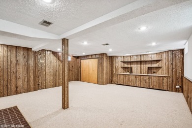 This sun-drenched 3-bedroom, 2.5-bath classic brick on Billy Caldwell Golf Course in Illinois - for sale on GolfHomes.com, golf home, golf lot