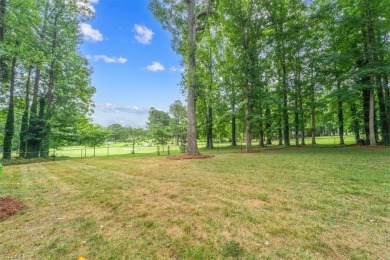 Welcome to this stunning home, renovated in 2021, offering a on Forest Oaks Country Club in North Carolina - for sale on GolfHomes.com, golf home, golf lot