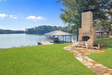 This stunning 4-bedroom, custom built 3408 sq ft lake front home on Hide-A-Way Lake Golf Course in Texas - for sale on GolfHomes.com, golf home, golf lot