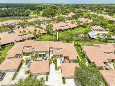 Discover comfort and charm in this well-maintained, light-filled on PGA National Golf Club in Florida - for sale on GolfHomes.com, golf home, golf lot
