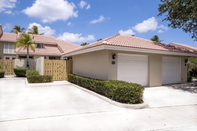 Discover comfort and charm in this well-maintained, light-filled on PGA National Golf Club in Florida - for sale on GolfHomes.com, golf home, golf lot
