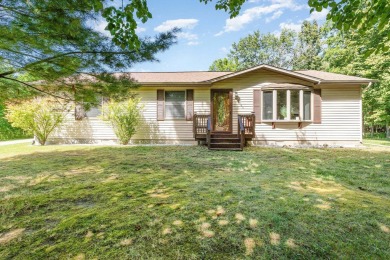 This well-maintained 3 bedroom 2 bath house sits on a double lot on Sugar Springs Country Club in Michigan - for sale on GolfHomes.com, golf home, golf lot
