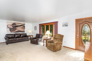 This well-maintained 3 bedroom 2 bath house sits on a double lot on Sugar Springs Country Club in Michigan - for sale on GolfHomes.com, golf home, golf lot