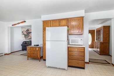 This well-maintained 3 bedroom 2 bath house sits on a double lot on Sugar Springs Country Club in Michigan - for sale on GolfHomes.com, golf home, golf lot