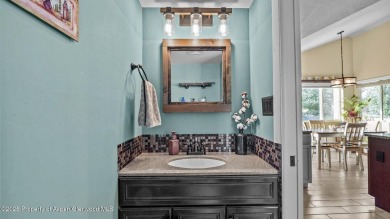 Find comfort and charm in a home nestled on the scenic fairways on Battlement Mesa Golf Course in Colorado - for sale on GolfHomes.com, golf home, golf lot