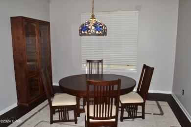 CURRENTLY UNDER CONTRACT, SELLER WILL CONSIDER BACKUP OFFERS on Holiday Golf Club in Florida - for sale on GolfHomes.com, golf home, golf lot