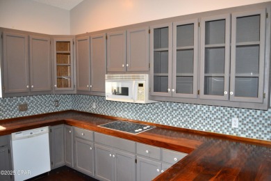 CURRENTLY UNDER CONTRACT, SELLER WILL CONSIDER BACKUP OFFERS on Holiday Golf Club in Florida - for sale on GolfHomes.com, golf home, golf lot
