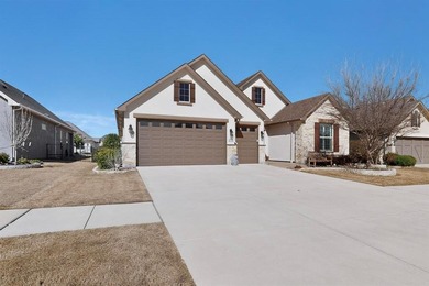 Welcome to this beautiful Fresco model home with a golf cart on Wildhorse Golf Club of Robson Ranch in Texas - for sale on GolfHomes.com, golf home, golf lot