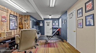 Find comfort and charm in a home nestled on the scenic fairways on Battlement Mesa Golf Course in Colorado - for sale on GolfHomes.com, golf home, golf lot