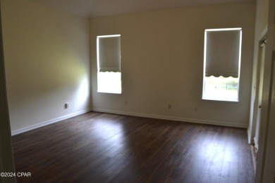 CURRENTLY UNDER CONTRACT, SELLER WILL CONSIDER BACKUP OFFERS on Holiday Golf Club in Florida - for sale on GolfHomes.com, golf home, golf lot