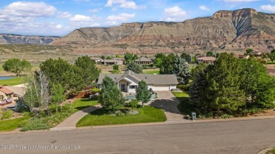 Find comfort and charm in a home nestled on the scenic fairways on Battlement Mesa Golf Course in Colorado - for sale on GolfHomes.com, golf home, golf lot