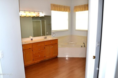 CURRENTLY UNDER CONTRACT, SELLER WILL CONSIDER BACKUP OFFERS on Holiday Golf Club in Florida - for sale on GolfHomes.com, golf home, golf lot