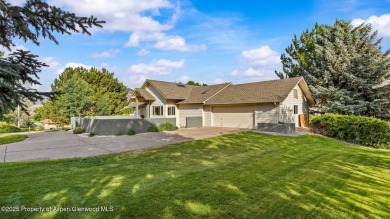 Find comfort and charm in a home nestled on the scenic fairways on Battlement Mesa Golf Course in Colorado - for sale on GolfHomes.com, golf home, golf lot