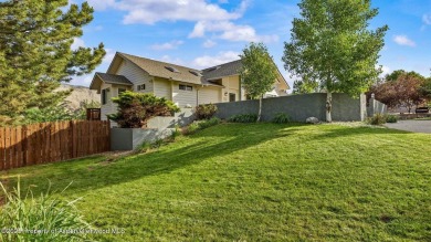 Find comfort and charm in a home nestled on the scenic fairways on Battlement Mesa Golf Course in Colorado - for sale on GolfHomes.com, golf home, golf lot