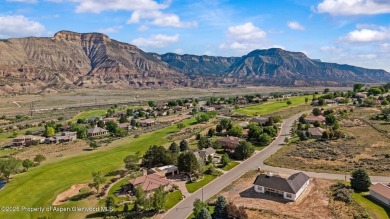 Find comfort and charm in a home nestled on the scenic fairways on Battlement Mesa Golf Course in Colorado - for sale on GolfHomes.com, golf home, golf lot